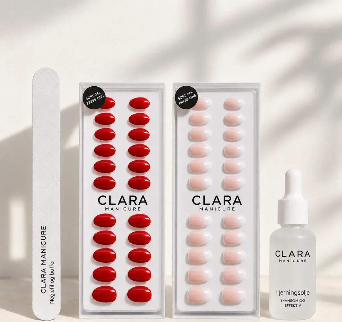 To esker Clara Manicure, neglefil og buffer og en flaske fjerningsolje